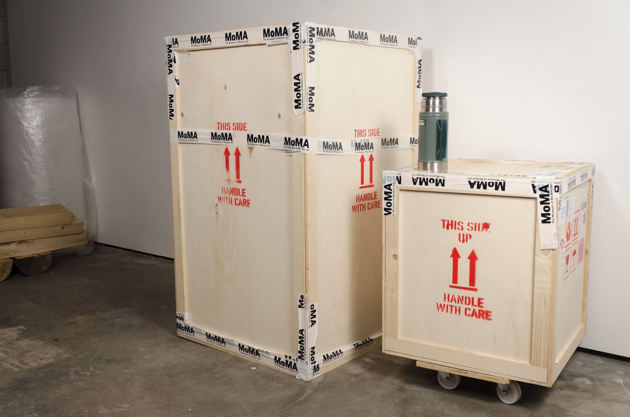 Art shipping crates, secured with MoMA tape by Melle Nieling